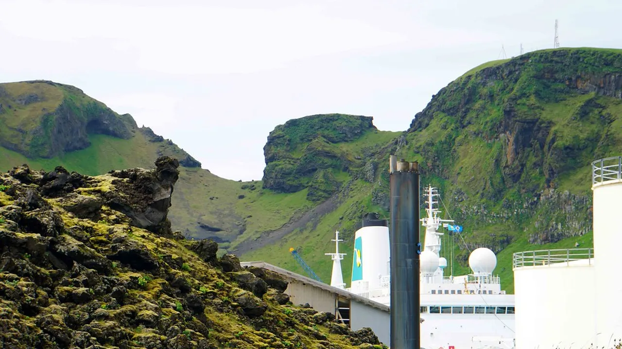 1. Start at the Heimaey Harbour and Town Center